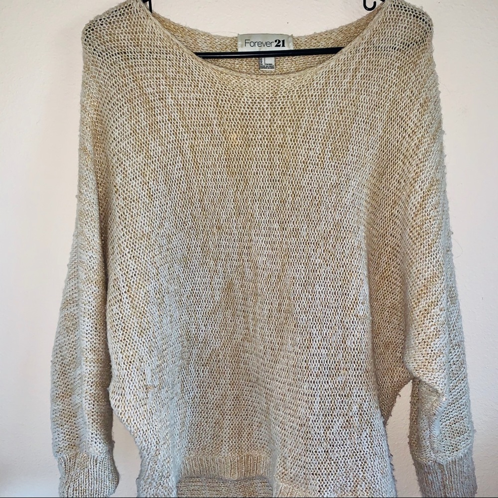 • • Cream colored sweatshirt • •